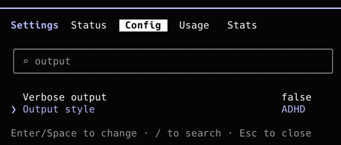 The Claude Code config panel, showing Output style set to ADHD